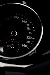black and white speedometer at 0
