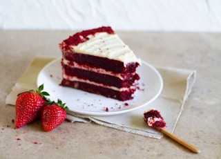 strawberry cake on white ceramic plate