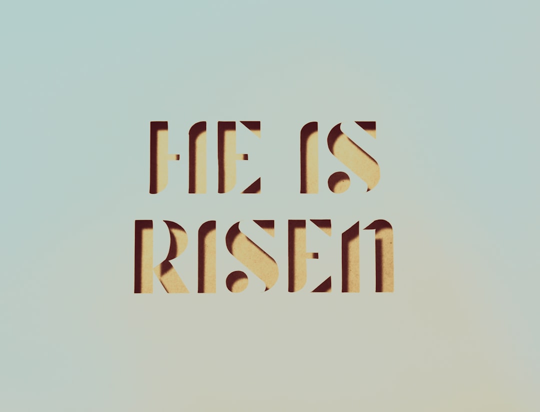 text, Papercut words of He is Risen for Easter