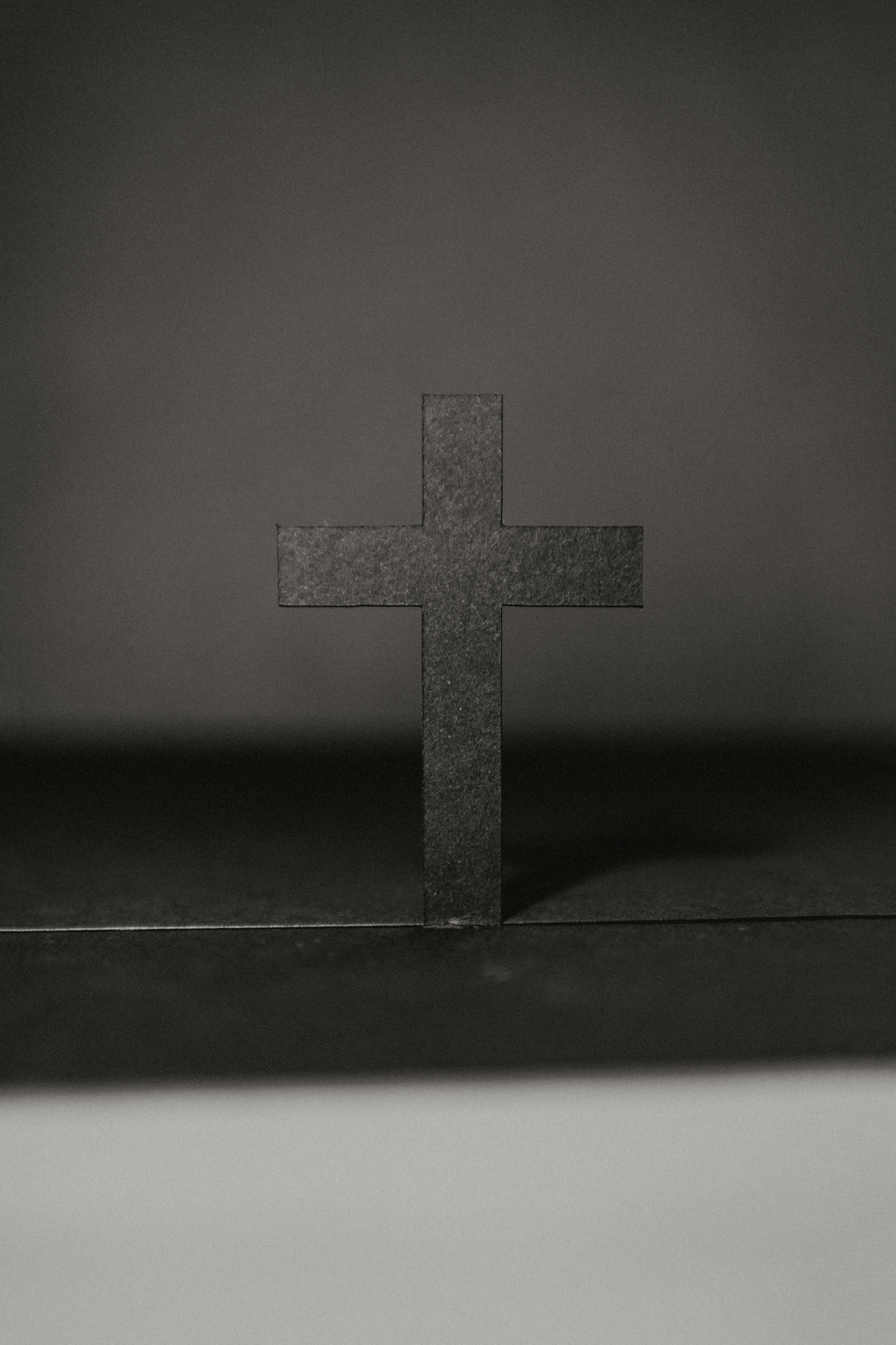 paper cut cross in black and white