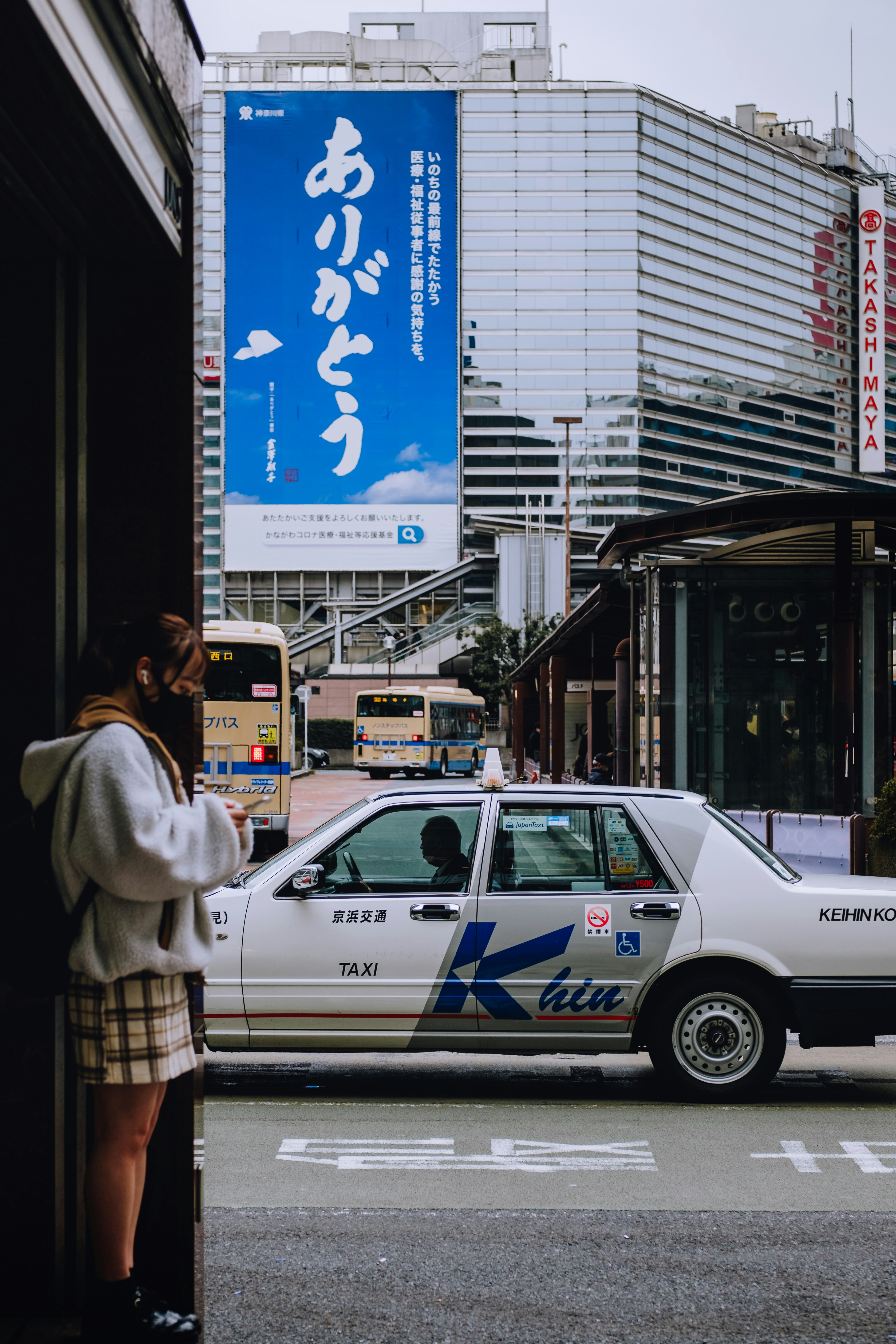 white and blue car on road during daytime