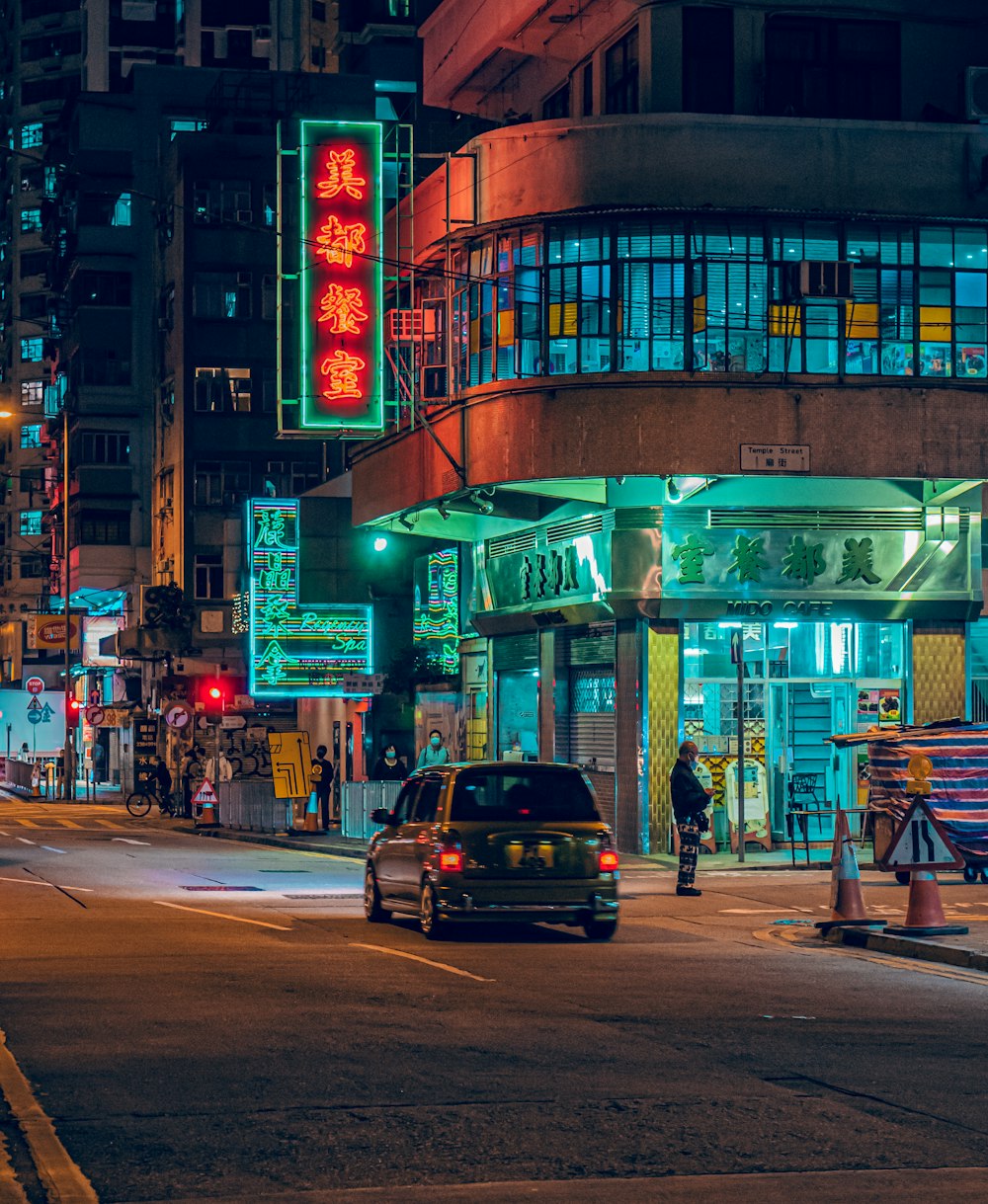 cars on road in city during night time