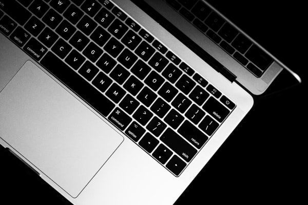 MacBook Pro being repaired by a technician in Saskatoon