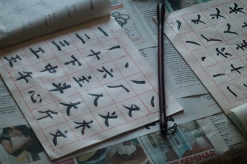 black metal rod on white and black floor tiles