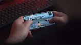 person holding black samsung android smartphone