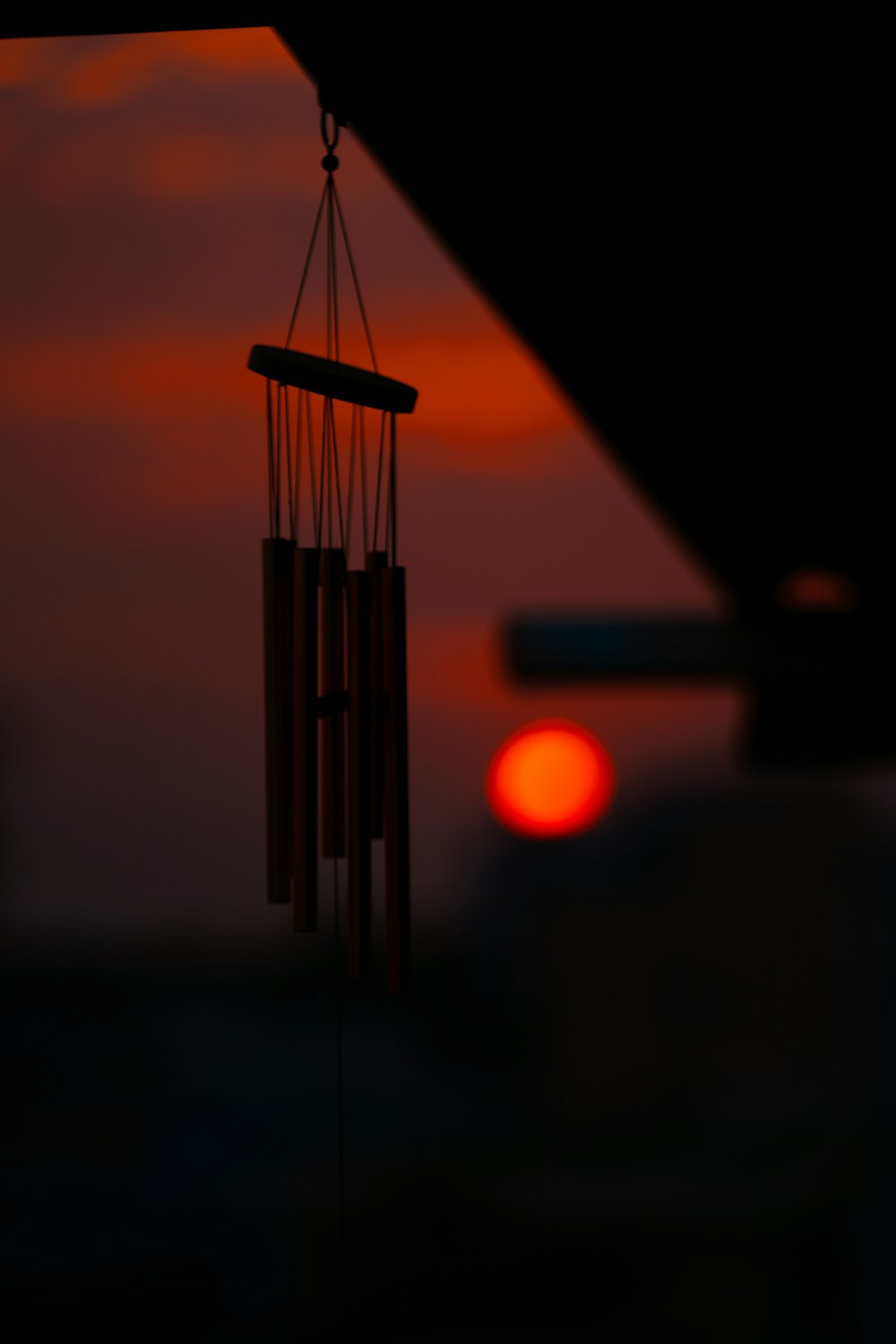 gray and orange wind chime