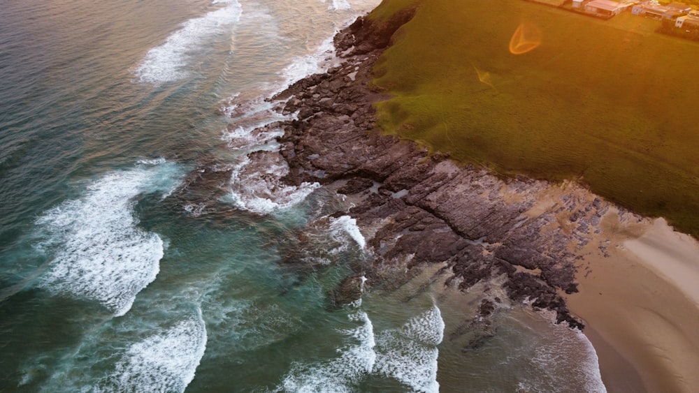 a bird's eye view of a beach and ocean