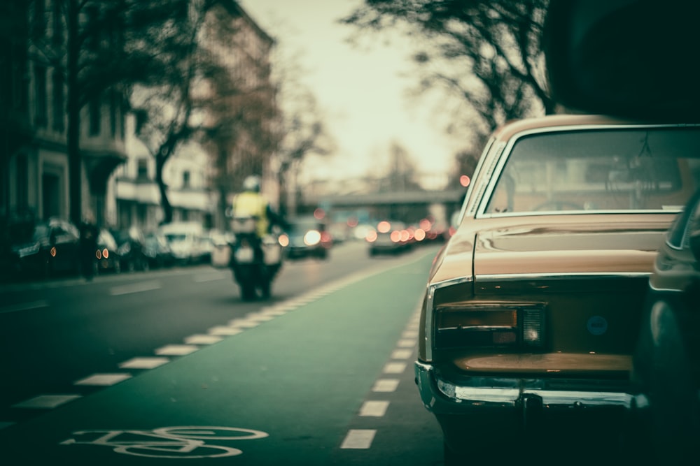 grayscale photo of car on road