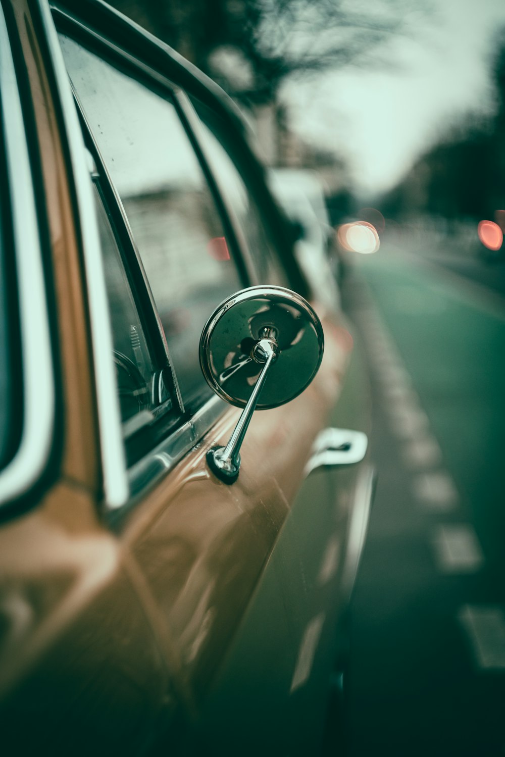 brown car in tilt shift lens