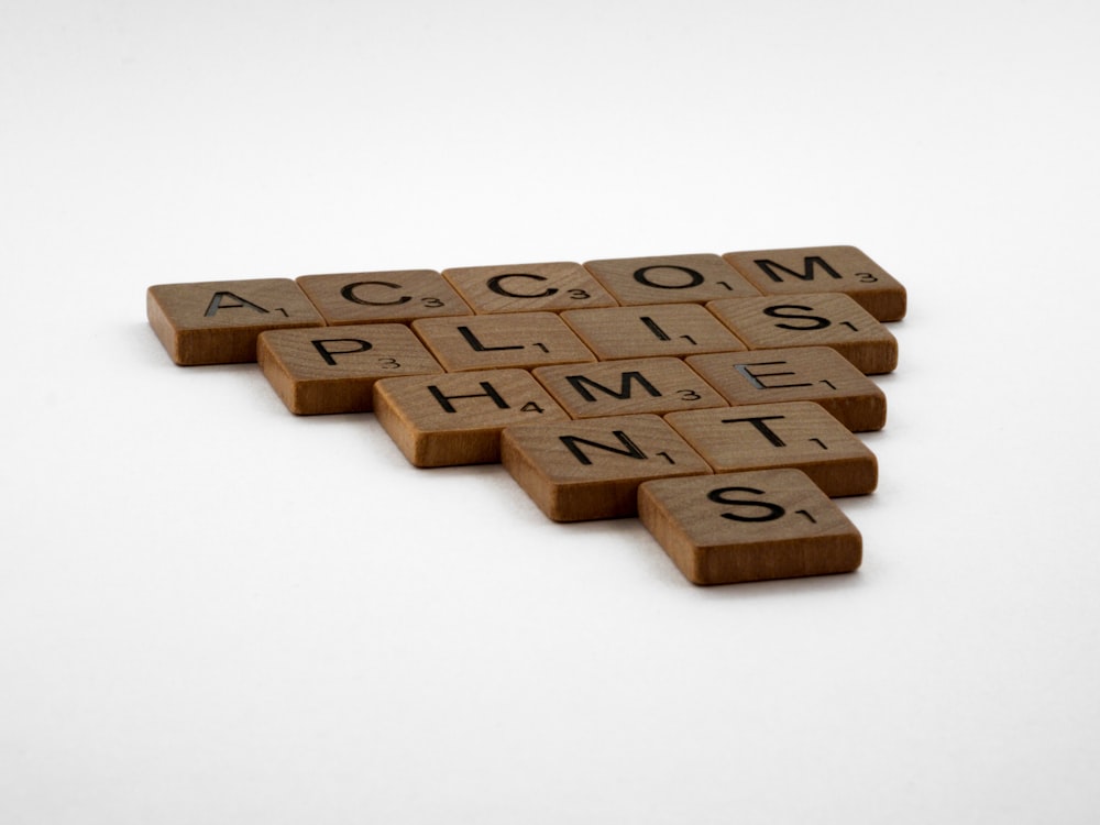 brown wooden blocks on white surface