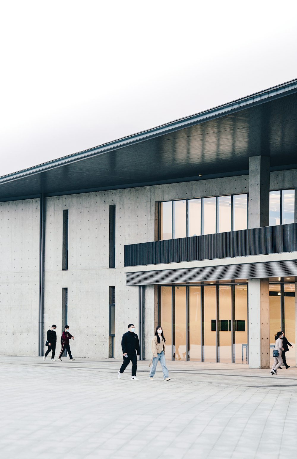 people walking on street near building during daytime