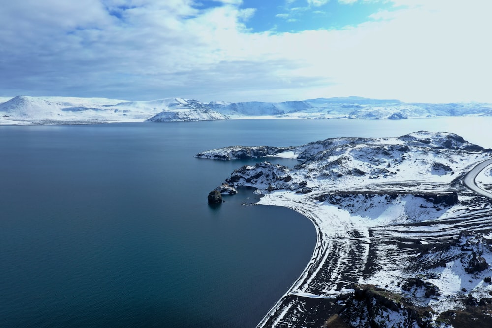 aerial view of city near body of water during daytime