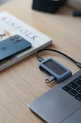 black usb cable on macbook pro