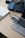 A close-up of a modern workspace with a laptop and minimalistic decor.