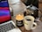 An inviting image of a cozy home office setup with a laptop and a cup of tea.