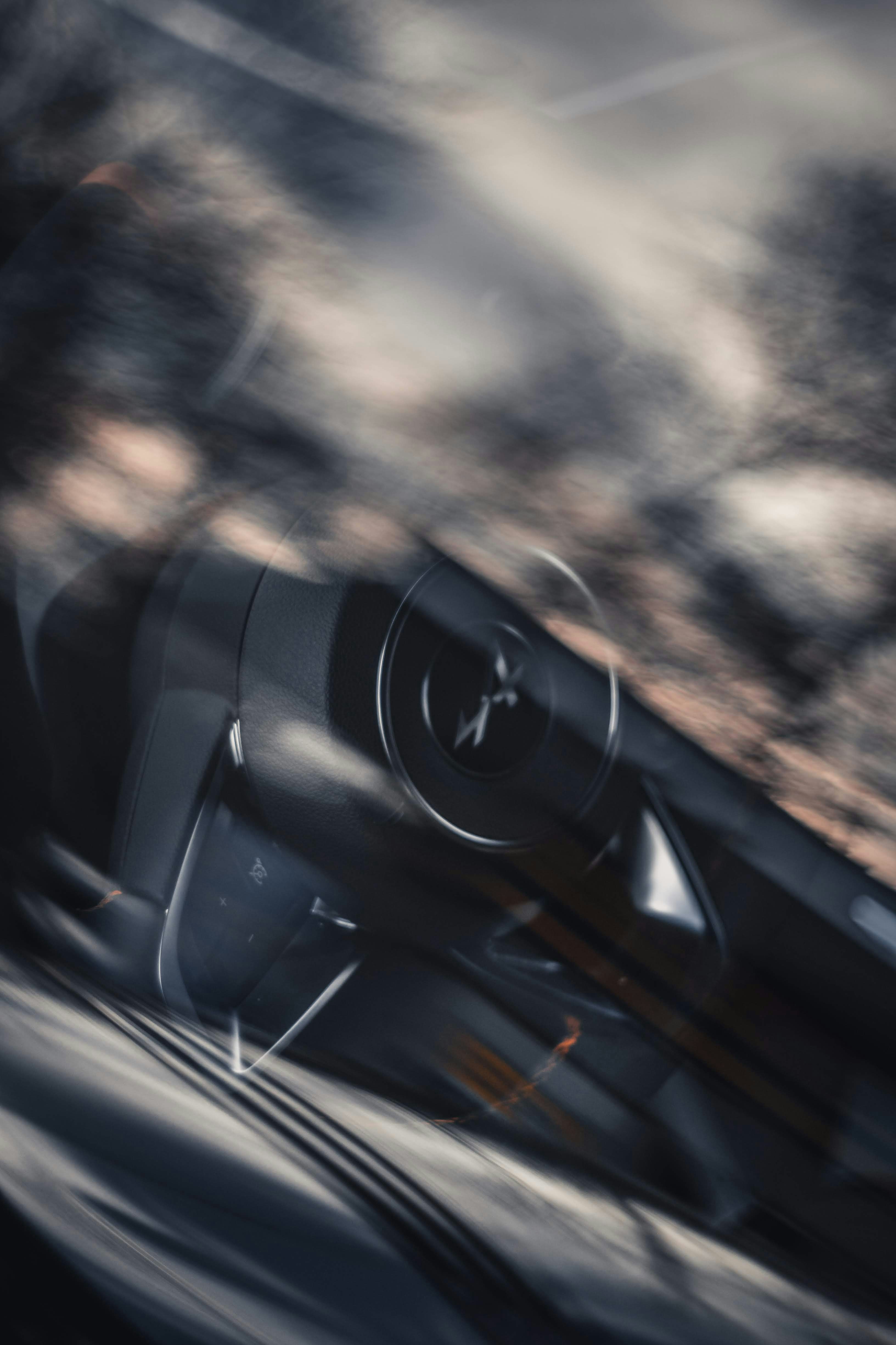 black camera on brown and black marble surface