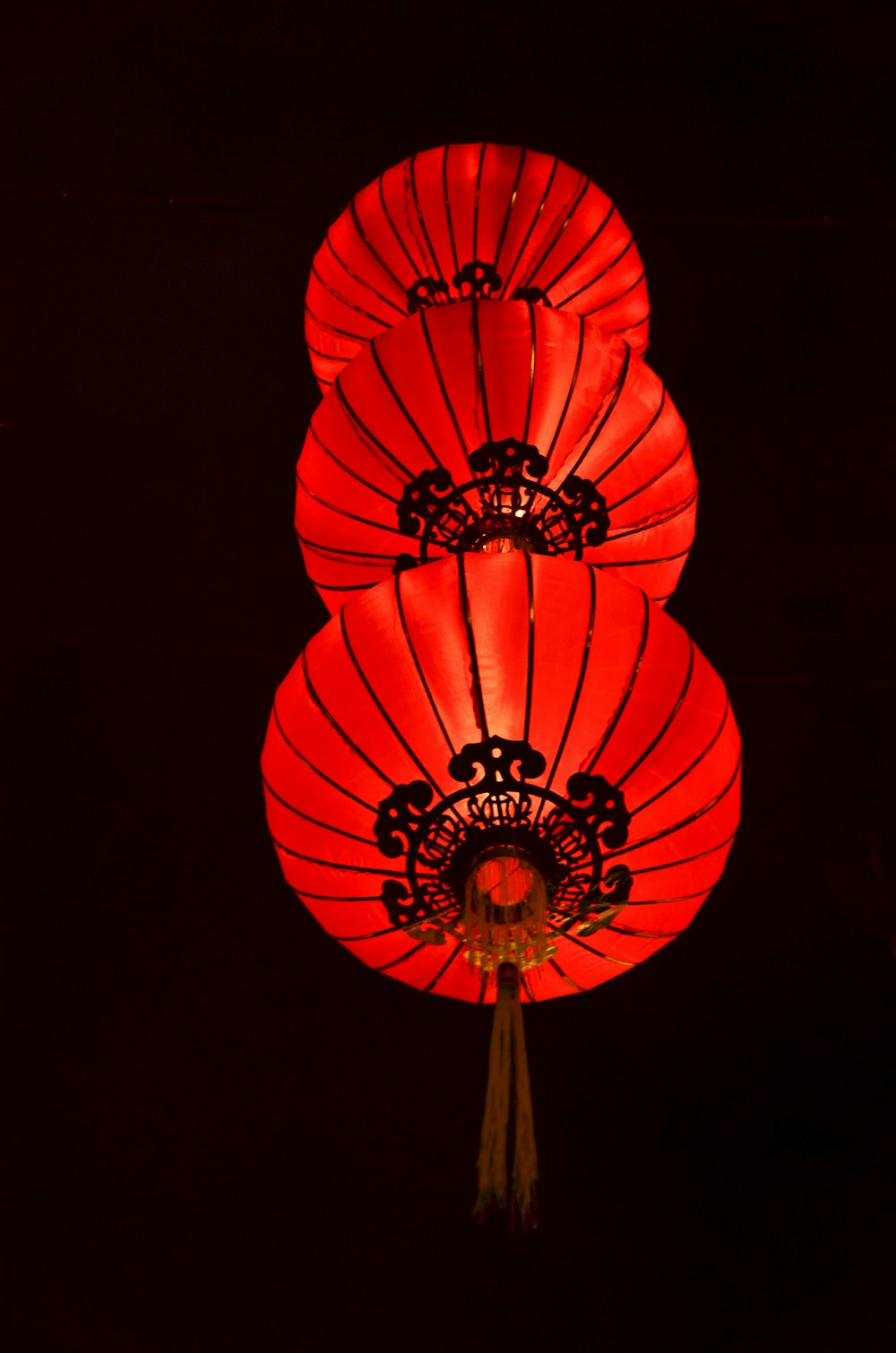 red heart balloon with black background