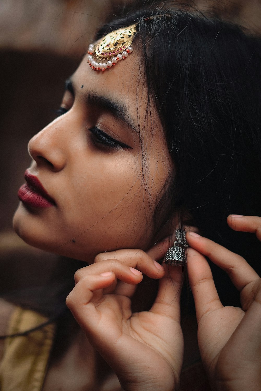 woman with silver ring and silver ring