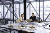 man and woman sitting at table
