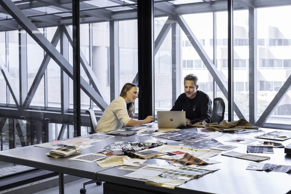 man and woman sitting at table