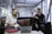A professional lawyer consulting with a client in a modern office setting.