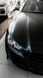 black car on road during daytime