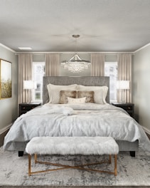 Close-up of luxury bedroom details with soft lighting and plush bedding.