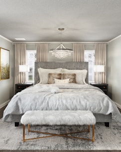 Luxurious bedroom interior with gold accents and ambient lighting.