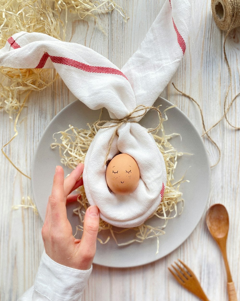 white egg on white ceramic plate