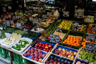red apples on green plastic crate