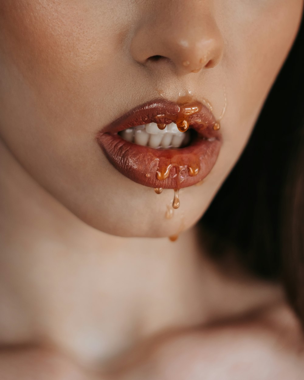 woman with brown and white lipstick