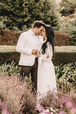it's a yes,how to photograph man in white suit kissing woman in white dress