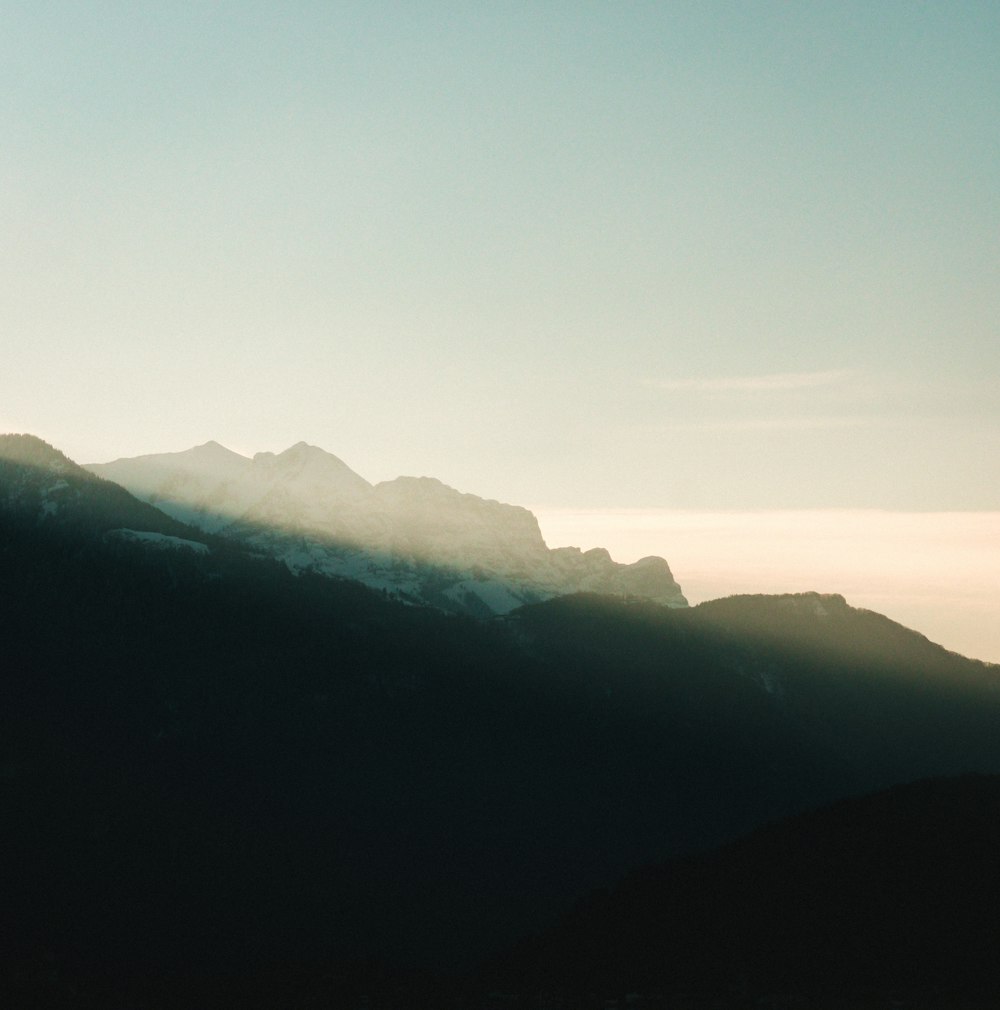 silhouette of mountains during daytime