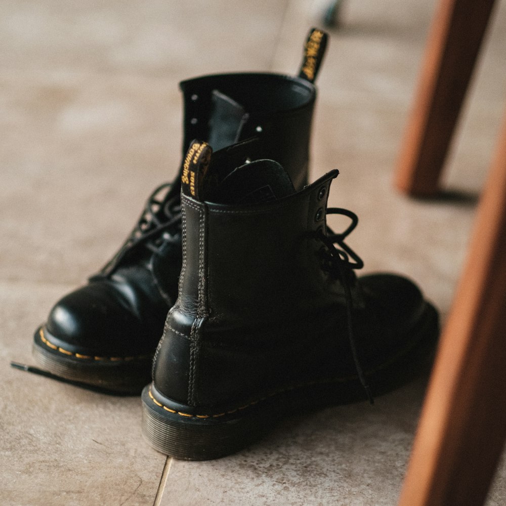 black leather lace up boots