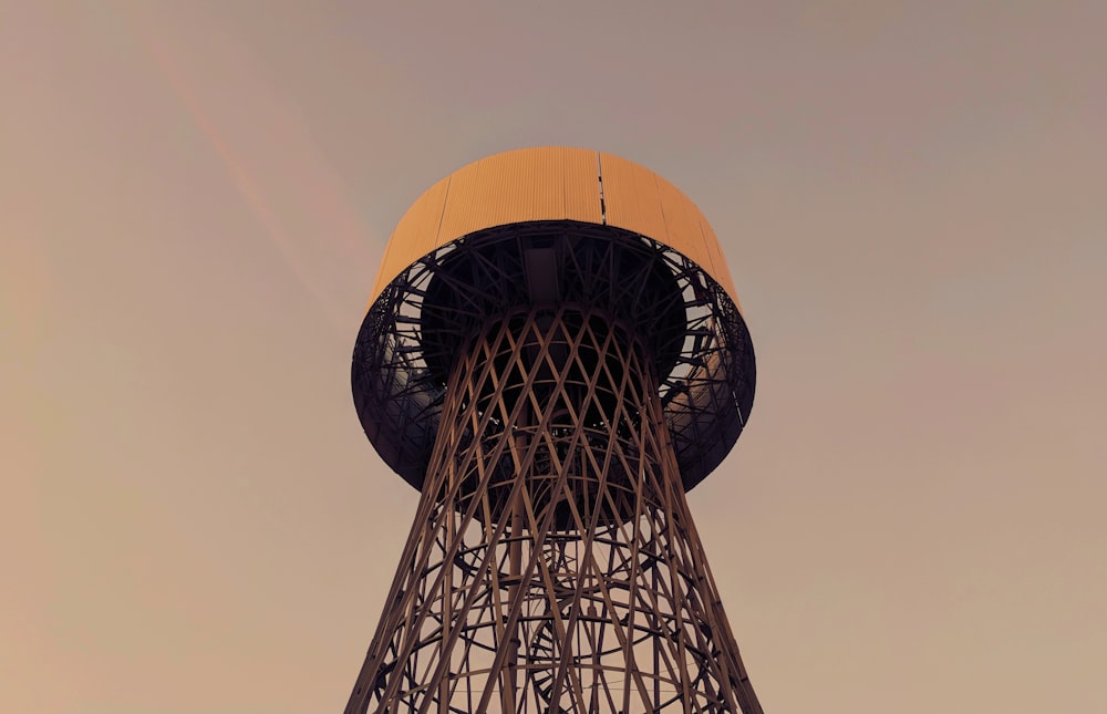 yellow and black tower under blue sky