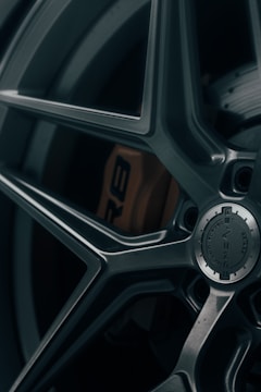 A close-up of a unique wheel rim showcasing intricate details.