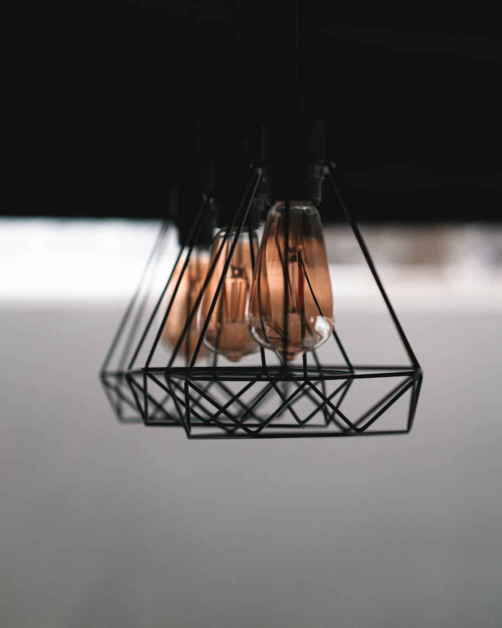 black metal frame with light bulb