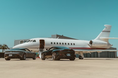 white passenger plane on airport during daytime
