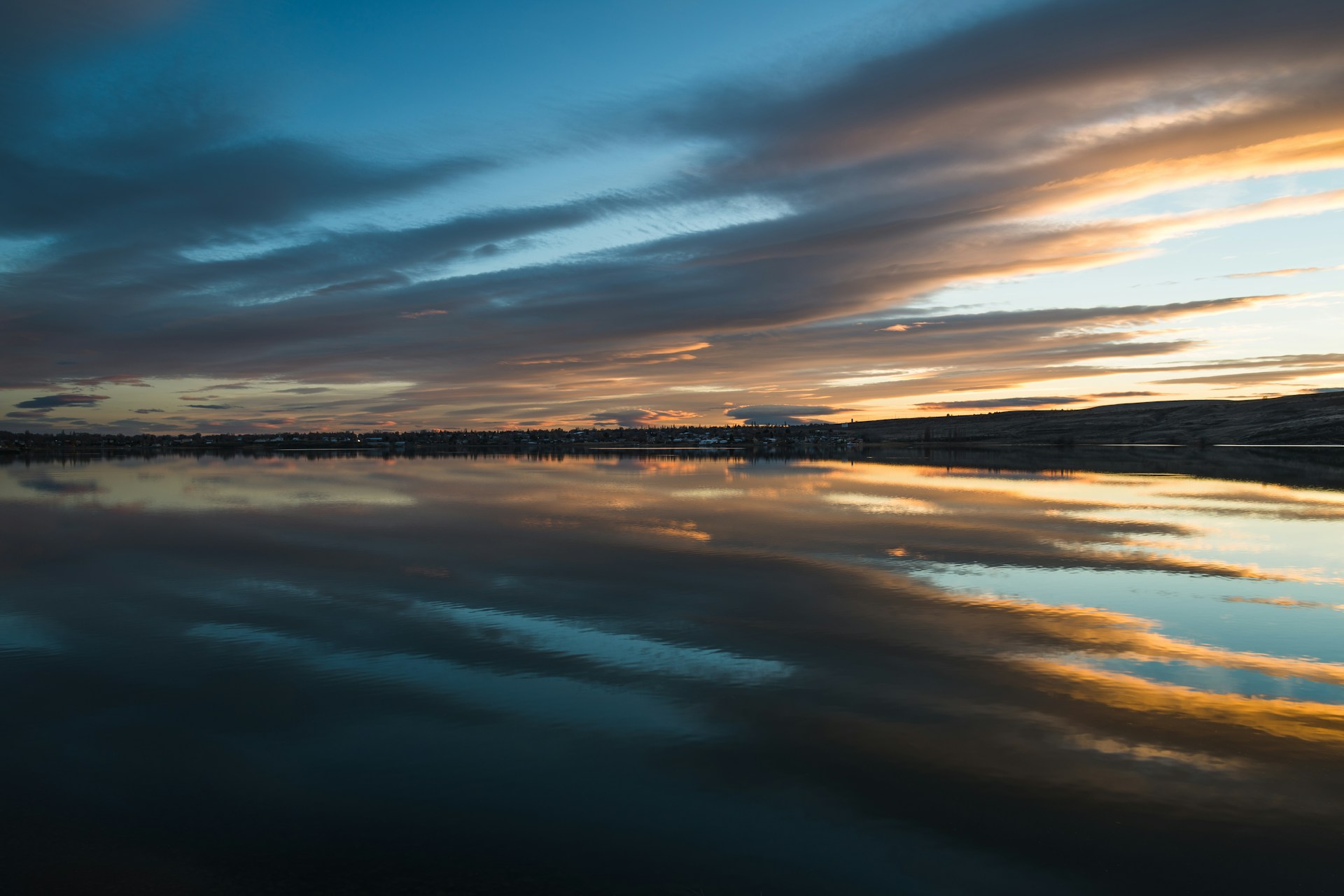 body of water during sunset