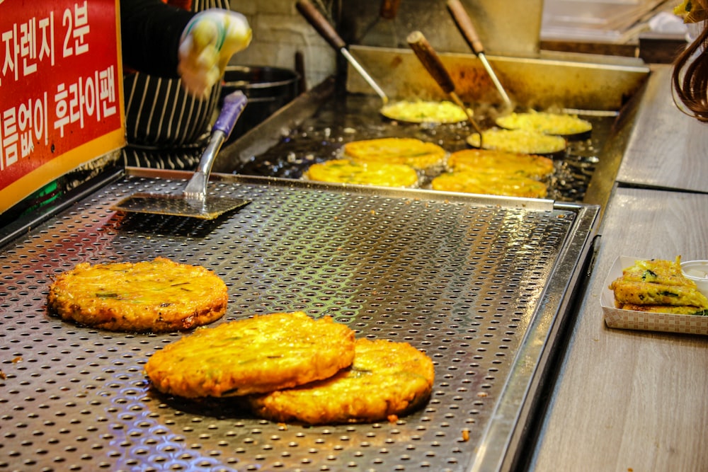 brown pastry on stainless steel tray