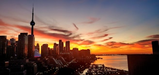 A city skyline at sunset, symbolizing the setting for many breaking news stories covered by zelodnews.