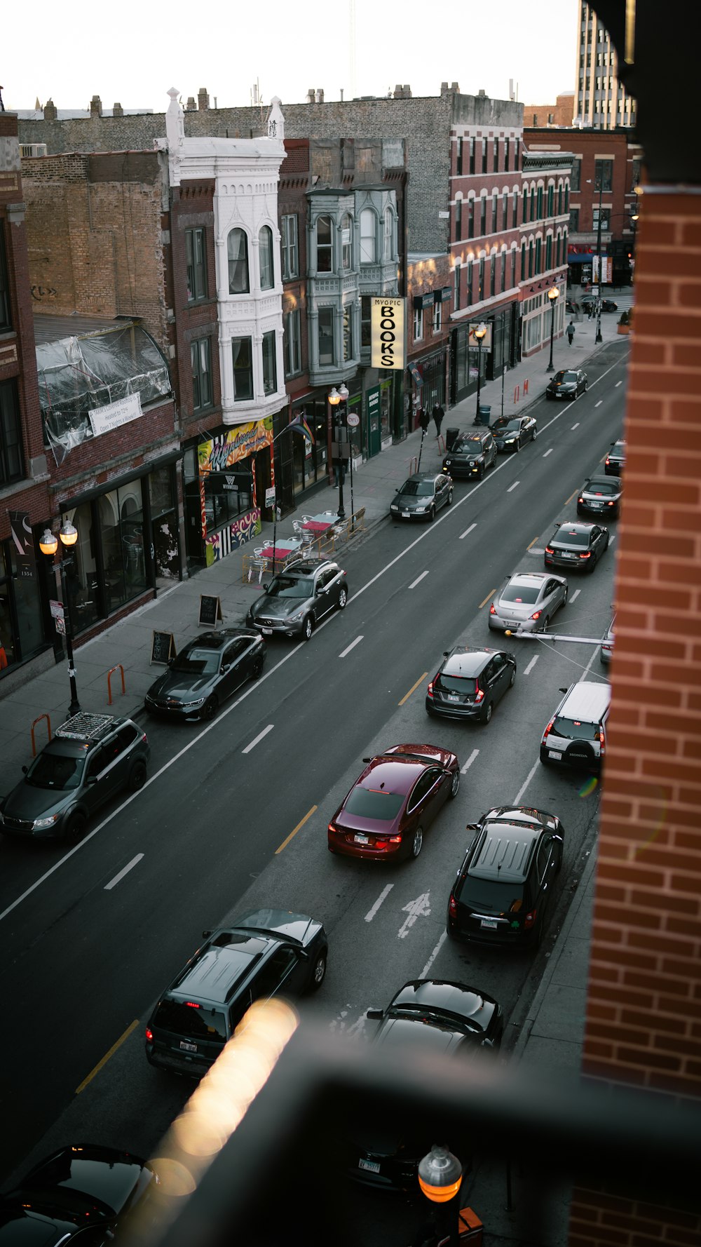 cars parked on side of the road during daytime