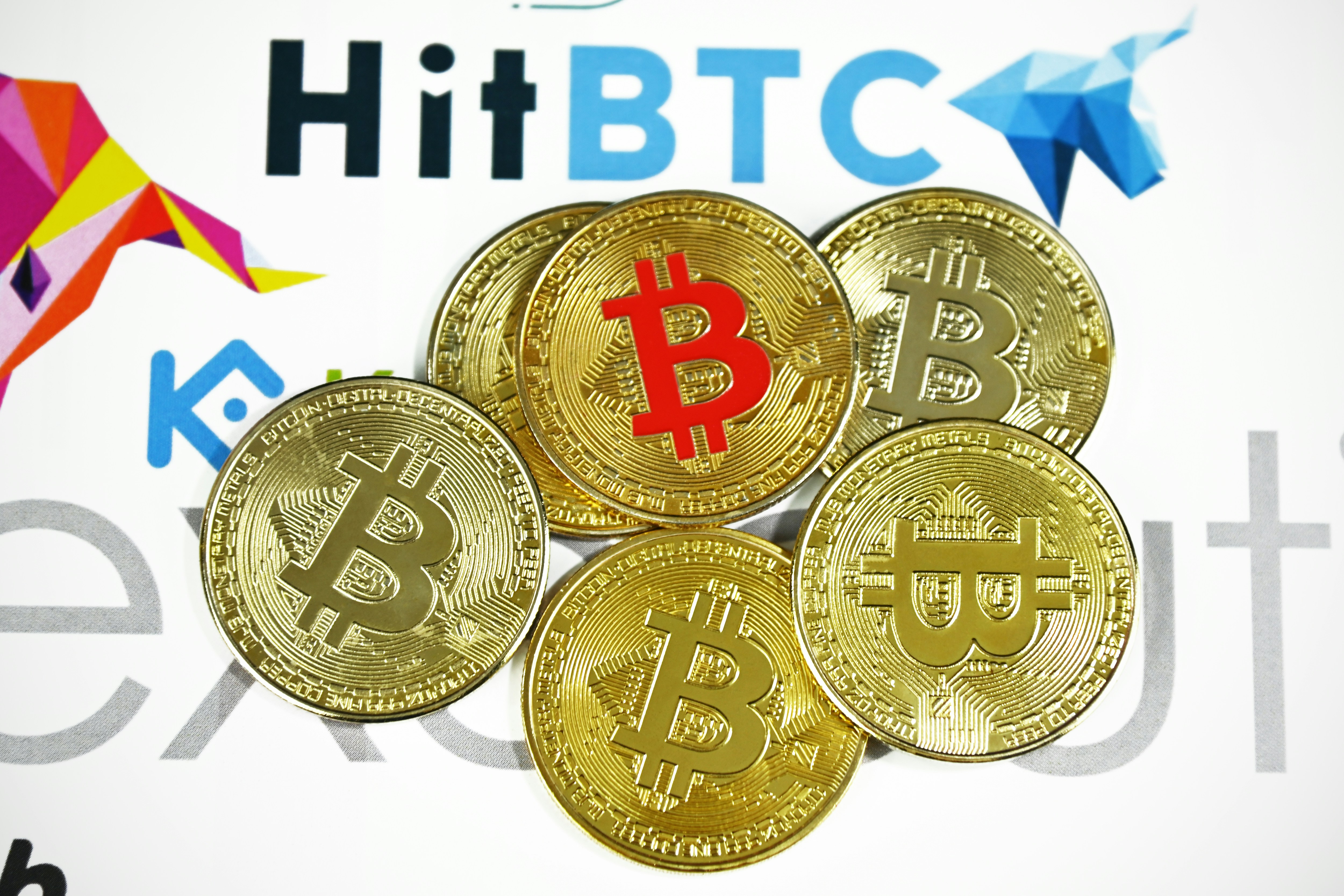 Six Bitcoin coins on Cryptocurrency exchange background