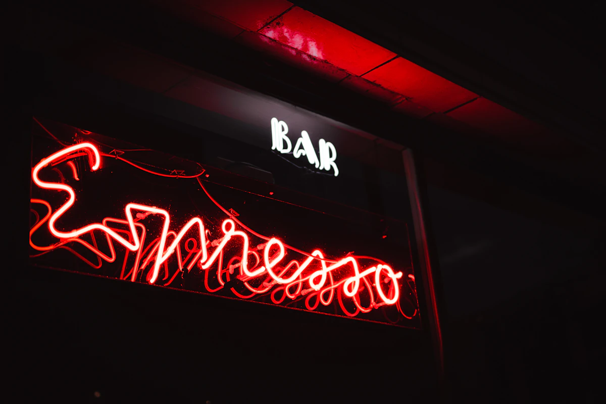 Neon lights and nightclub atmosphere similar to Tracks Denver