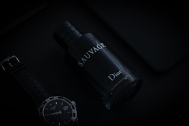 black and white round analog watch