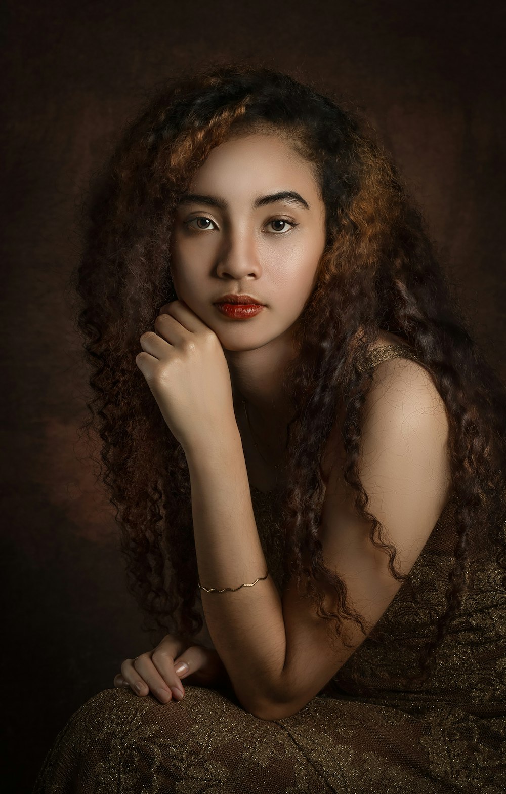 woman in brown floral lace dress