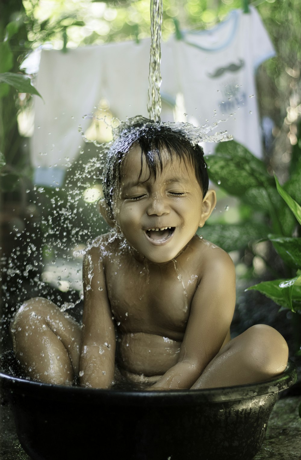 topless child with white floral headband