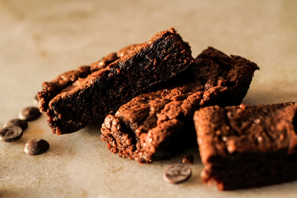 brown chocolate cookies on white textile