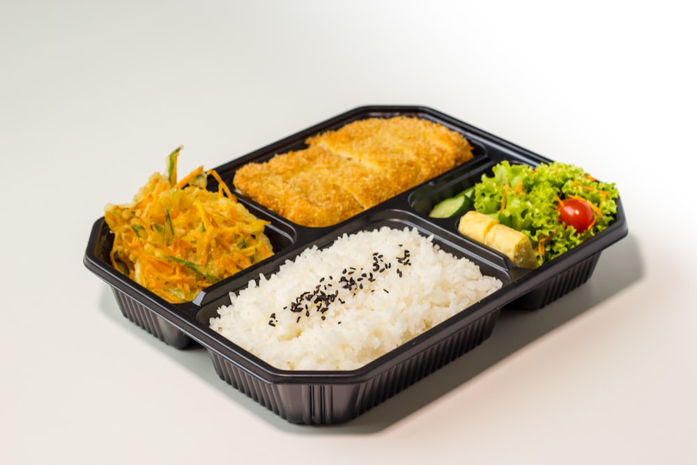 rice and rice on black plastic container