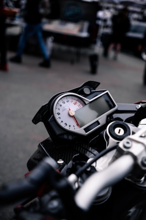 black and silver motorcycle speedometer